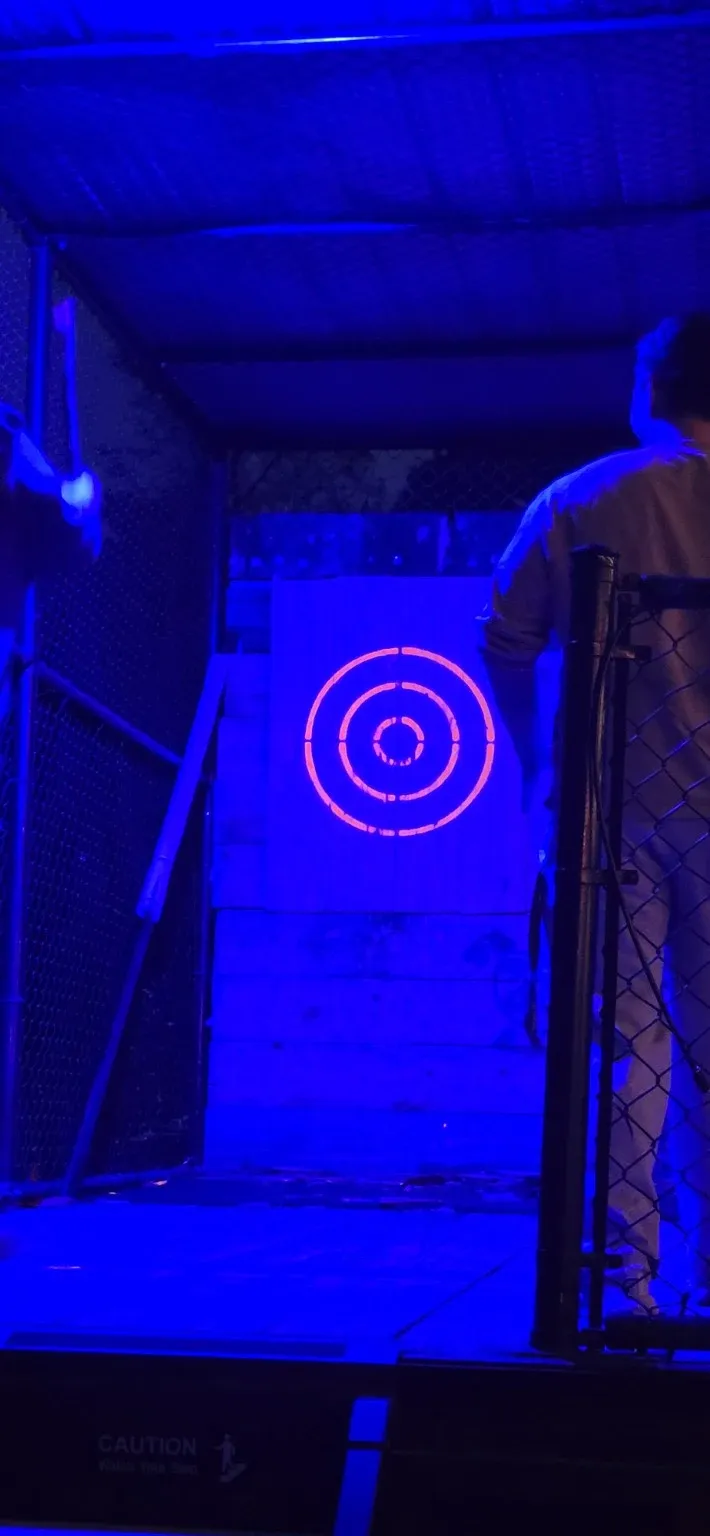 A target glowing under blue black light
